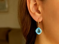 Load and play video in Gallery viewer, Drop Earrings with Blue Topaz Cushion Briolettes in 14k Yellow Gold