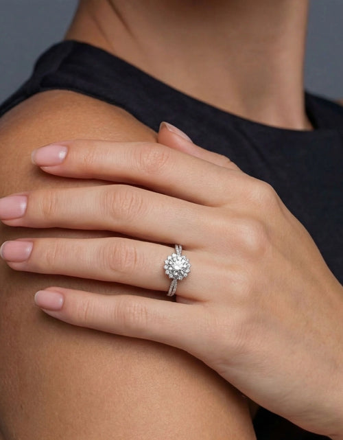 Load image into Gallery viewer, Simply Savvy Stellar Halo Moissanite Ring
