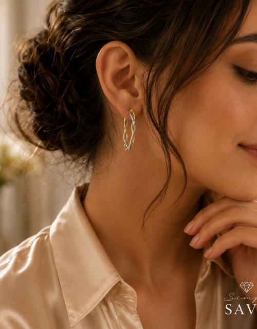 Load image into Gallery viewer, 10K Two Tone Gold Oval Twist Hoop Earrings
