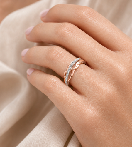 Simply Savvy “Intertwined Radiance” – 10K Two-Tone Gold Diamond Ring (1/10 CTW)