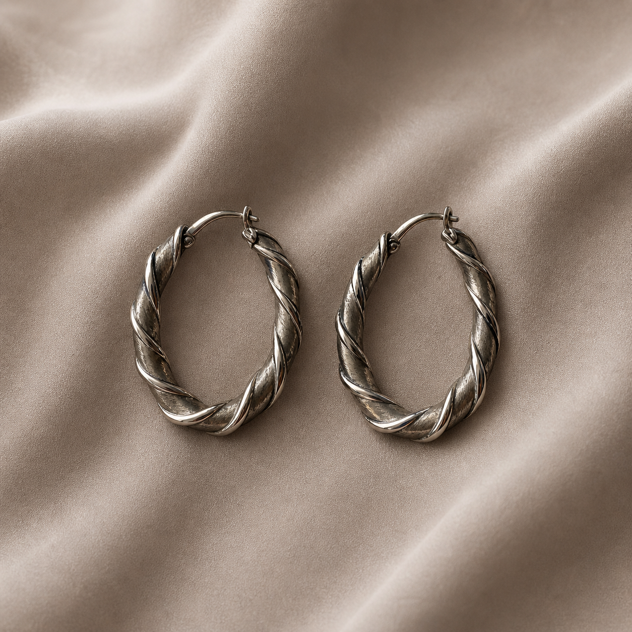 Simply Savvy “Twisted Radiance” Dobbs Sterling Silver Hoop Earrings
