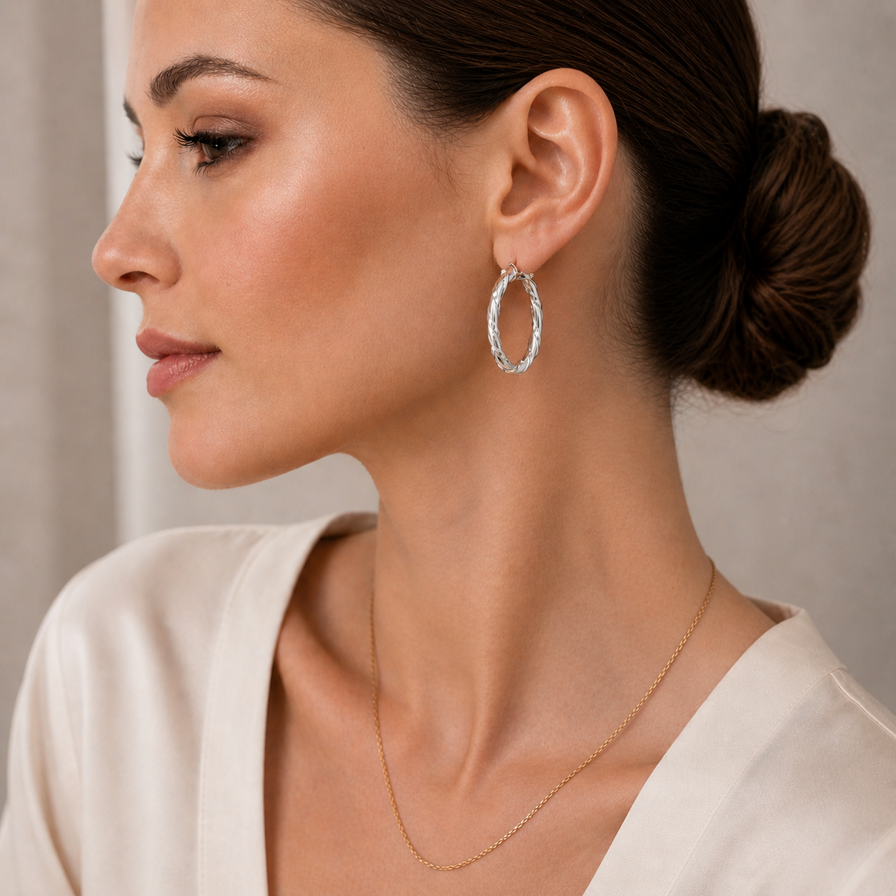 Simply Savvy “Twisted Radiance” Dobbs Sterling Silver Hoop Earrings