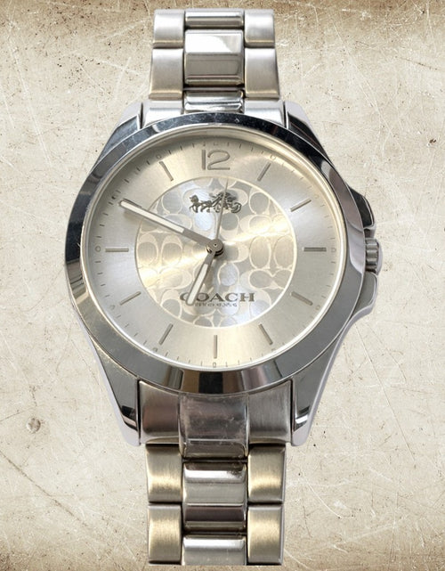 Load image into Gallery viewer, Coach Silver Signature Bangle Watch – Minimalist Bracelet Style (Pre-Owned)
