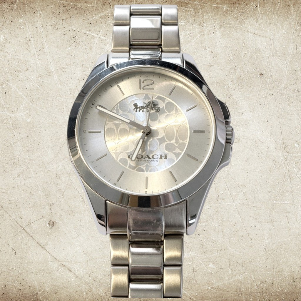 Coach Silver Signature Bangle Watch – Minimalist Bracelet Style (Pre-Owned)