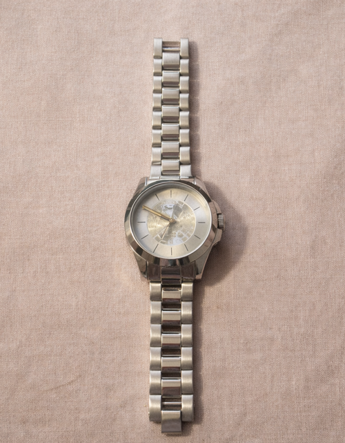 Load image into Gallery viewer, Coach Silver Signature Bangle Watch – Minimalist Bracelet Style (Pre-Owned)
