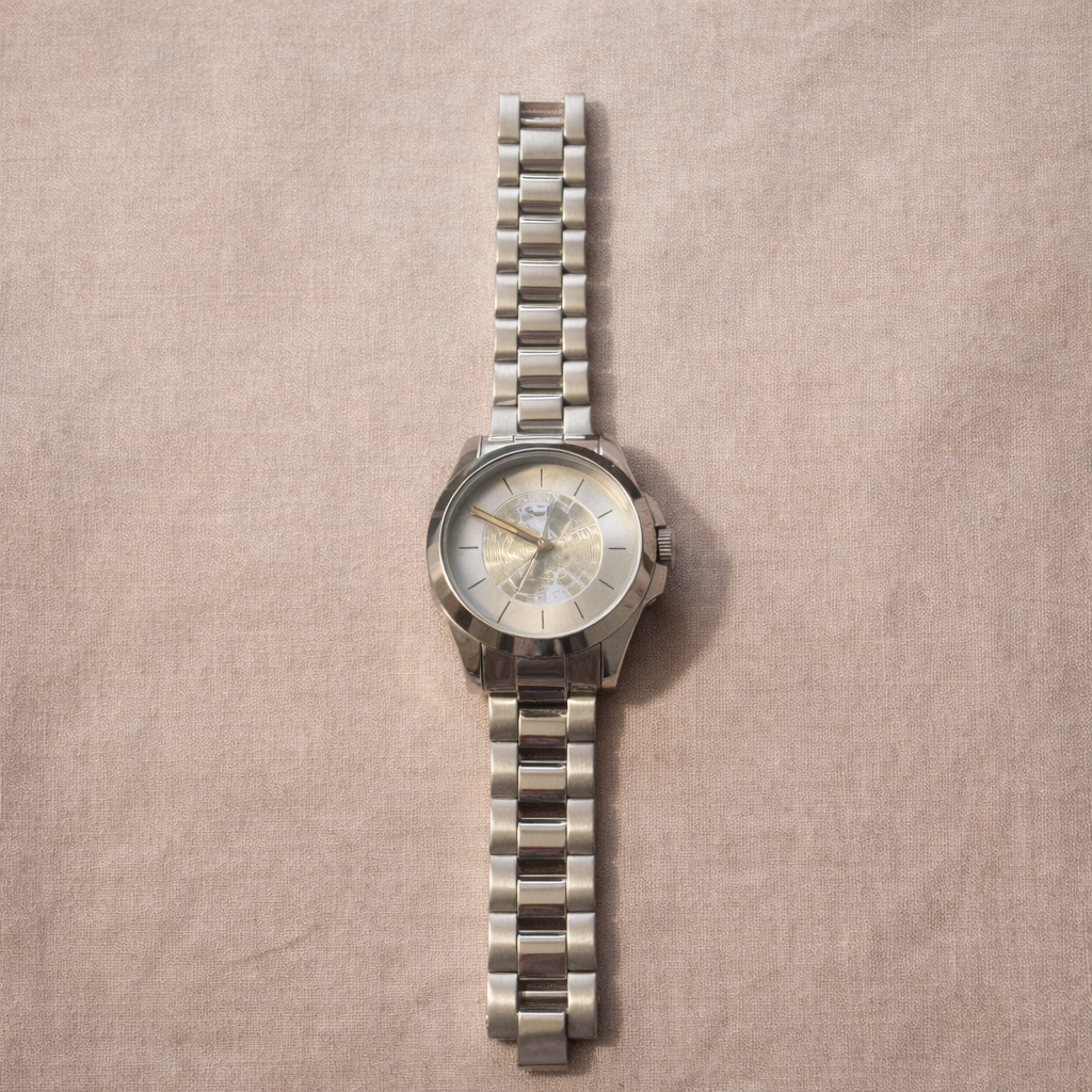 Coach Silver Signature Bangle Watch – Minimalist Bracelet Style (Pre-Owned)