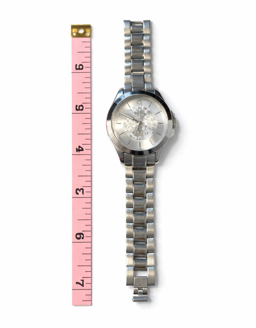 Load image into Gallery viewer, Coach Silver Signature Bangle Watch – Minimalist Bracelet Style (Pre-Owned)
