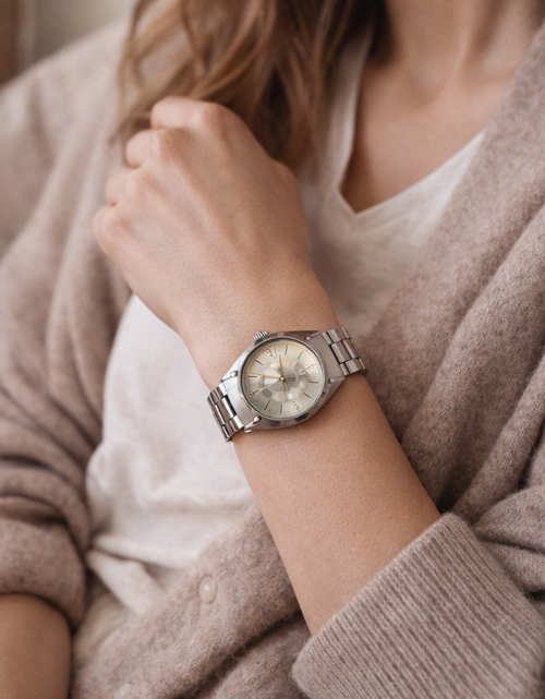 Load image into Gallery viewer, Coach Silver Signature Bangle Watch – Minimalist Bracelet Style (Pre-Owned)
