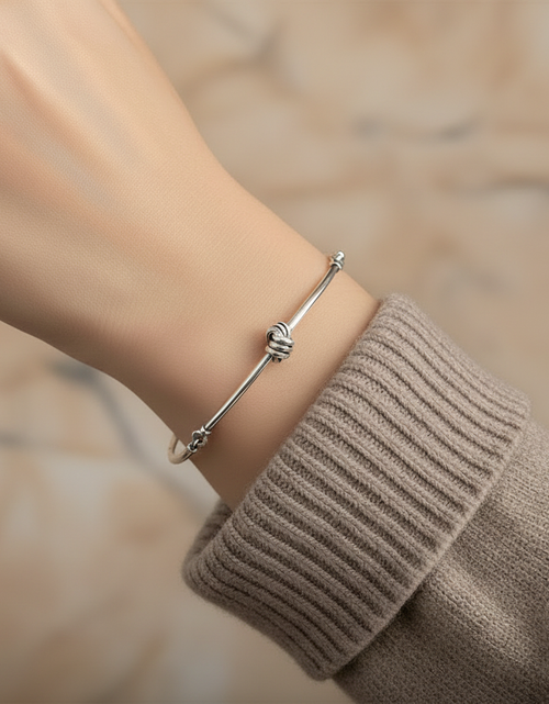 Load image into Gallery viewer, Pre-Owned Silpada Sterling Silver Love Knot Bangle Bracelet - Retired Design
